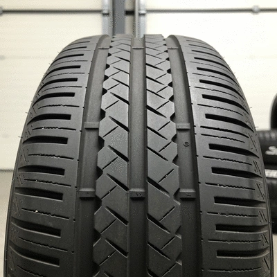 Close-up of a tire with visible wear indicators