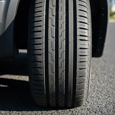 Close-up of a tire with good tread on a road