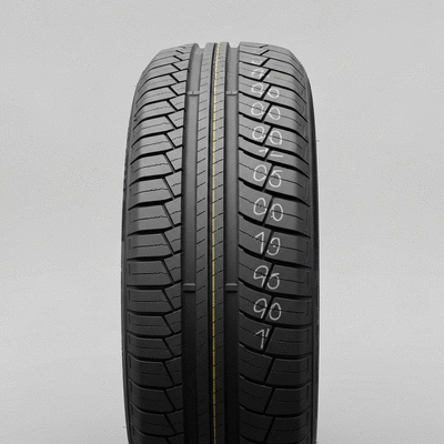 Car tire with visible tread pattern and clear markings