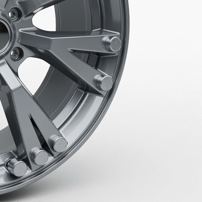 Car wheel with weights attached, symbolizing balancing process